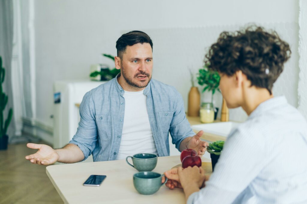A boyfriend getting upset because his girlfriend is accusing him of talking to someone else on Social Media.